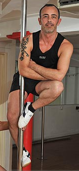 Pole Dancing Champ (via <a href="http://img.thesun.co.uk/multimedia/archive/00893/SNA2215POLE_280_893796a.jpg">The Sun</a>)